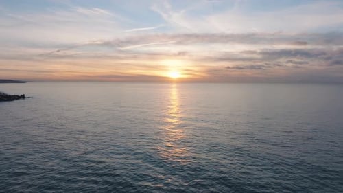 Aerial cinematic view of abandoned seaside fortification buildings at Karosta Northern Forts on the