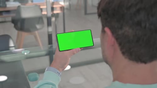 Holding Phone with Green Screen Chroma Key