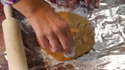 Gingerbread Cookie Creation Process at Baking Table