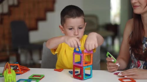Engaging in Creative Playtime Exploring the Joys of Building with Colorful Magnets Together