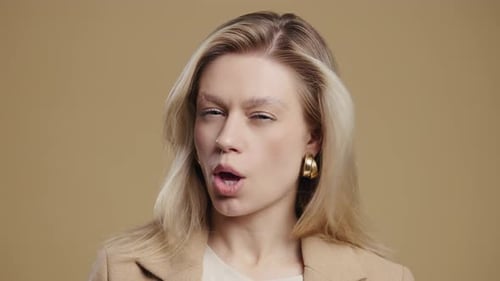 Attractive Young Woman Posing With Pursed Lips