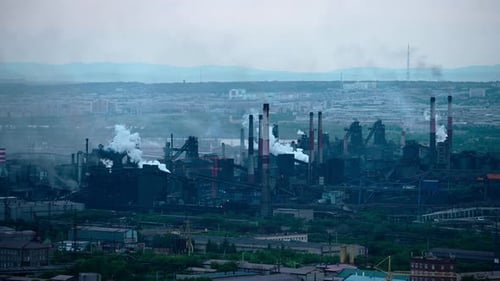 Factory Pipes Producing Dirty Smoke Clouds