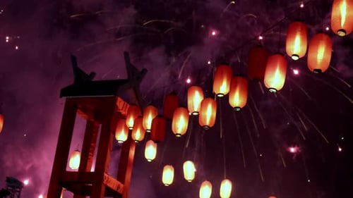 Red Lanterns and Fireworks Light up the Sky