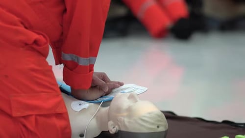 CPR demonstration on a medical mannequin