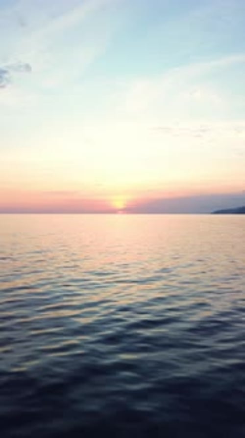 Calm Ocean at Sunset with Horizon