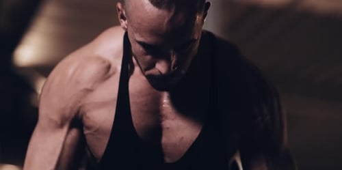 Bodybuilder in a Gym