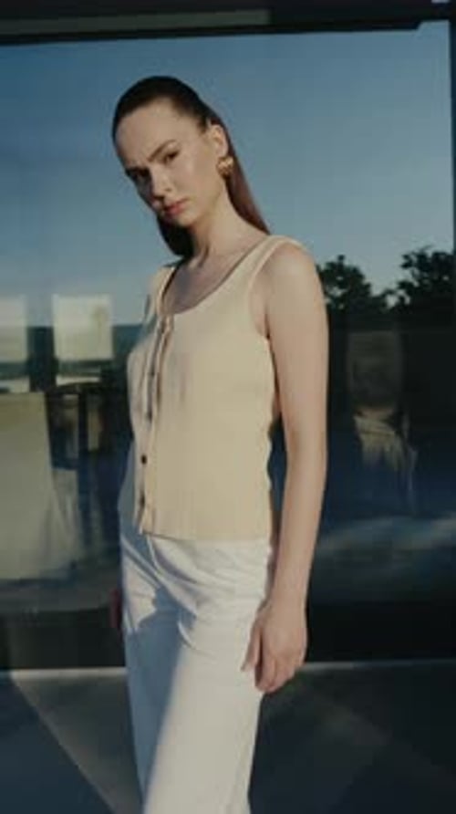 Woman Posing in a Stylish Outfit in the City