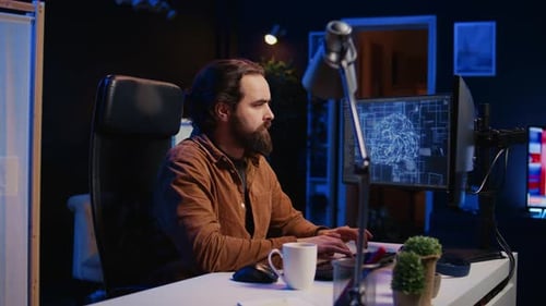 Teleworking IT Employee Runs AI Script on Computer From Home Office