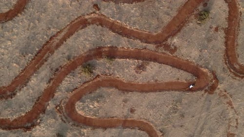 Mountain bike. Raider on circuit of mountain bike. Aerial view in descend. MTB. Granada. Spain.