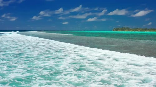 Aerial View of Waves Crashing on the Reef in Maldives Local Island