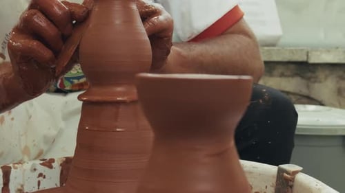 Shaping A Clay Pot In A Ceramics Workshop 11