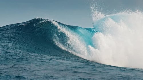 Ocean Wave Rolls and Breaks in the Maldives