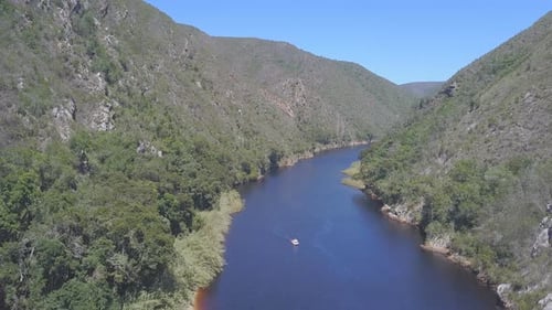 Aerial of boating on lake in South Africa for summer leisure fun and activity