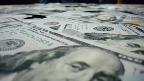 Hundreds Dollar Banknotes Scattered Table Close Up. Paper Bills American Currency With