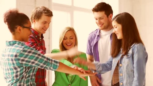 Education and School - Students Showing Unity with Their Hands Together All