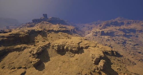 Majestic Rocky Landscape with Steep Cliffs and a Clear Blue Sky
