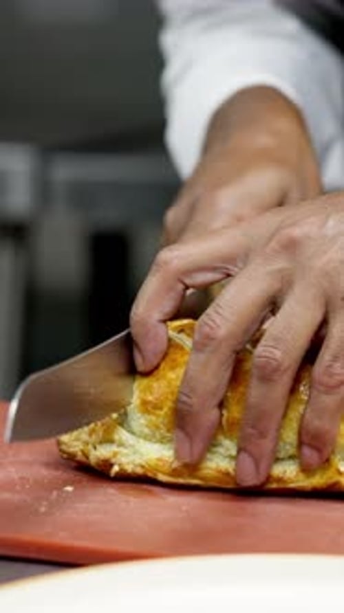 Hands, chef and cutting pie in kitchen, serving and meal prep for order