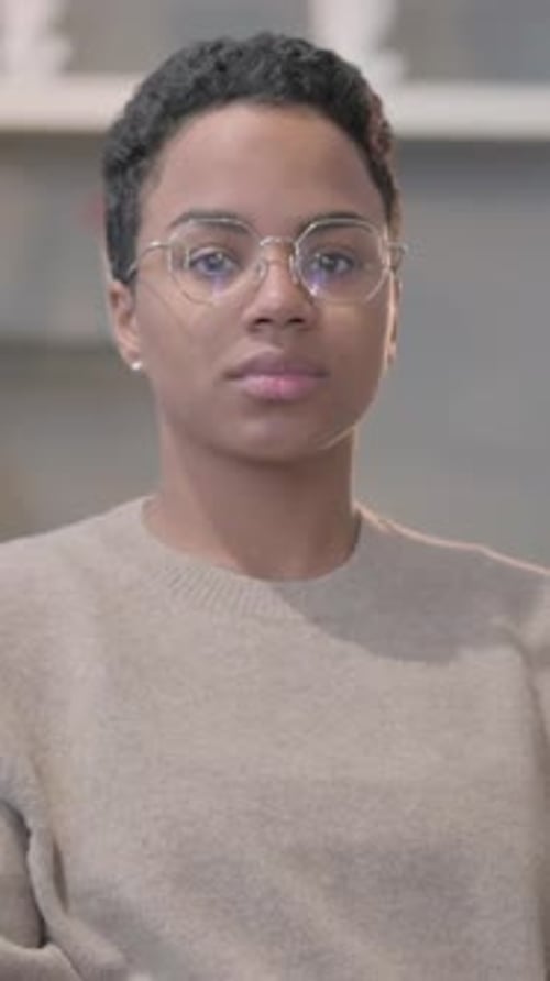 Portrait of African Woman Looking at the Camera, Vertical Video