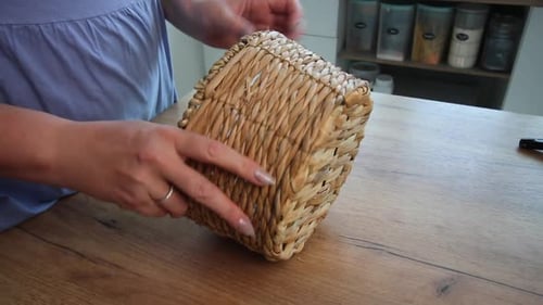 Woman Prepares Round Basket for Crafts Project