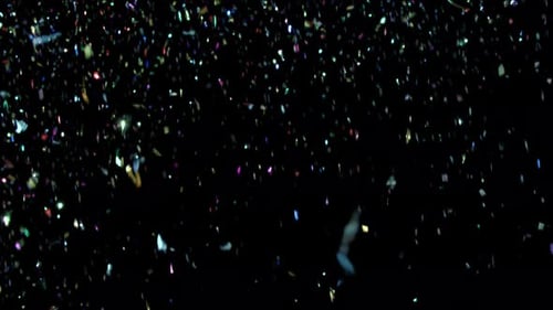 Studio Close Shot of Real Metallic Multi-Colored Confetti Tinsel with Alpha Channel