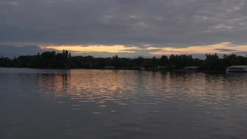 Sunset Sky Time Lapse. Clouds And Lake Timelapse Nature Background.