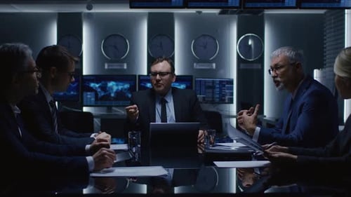 Stern Executives Strategize at Tense Boardroom Meeting