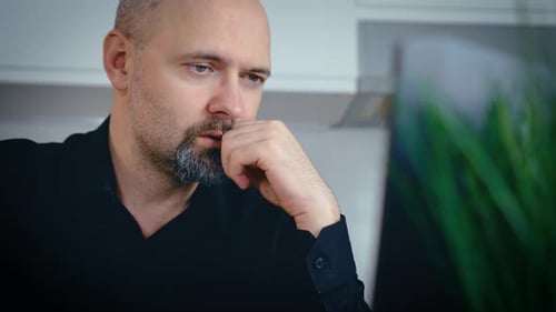 Portrait Professional Creative Man Sitting at His Desk in Home Office Studio Working on Laptop
