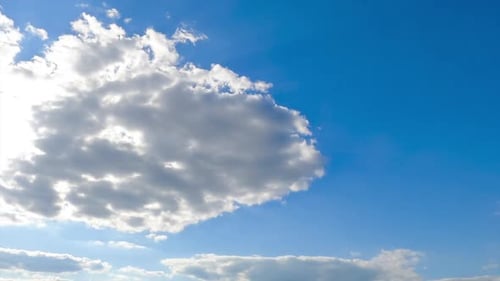 Clouds Drifting across the Blue Sky