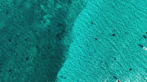 Coast as a background from top view. Waves and beach. Aerial landscape.