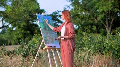 Creative Hobby Talented Female Artist Paints a Creative Picture in Park Background of Heathered
