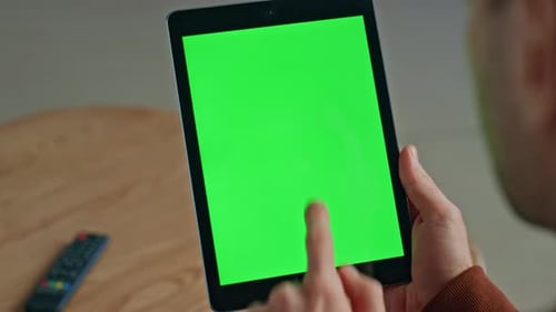 Man Holding Green Screen Tablet at House Closeup Unknown Freelancer Working