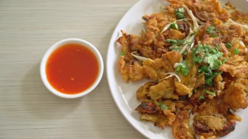 Crispy fried mussel pancake with egg - Thai street food style