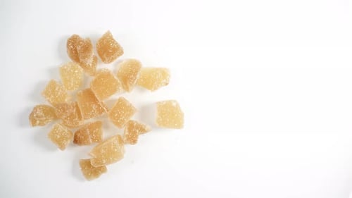 Crystallized Ginger Rotating On White.
