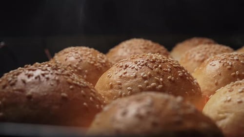 Golden Sesame Seed Burger Buns Toasting in Oven