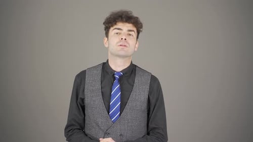 Young Man Extends Hand for Handshake, Medium Shot