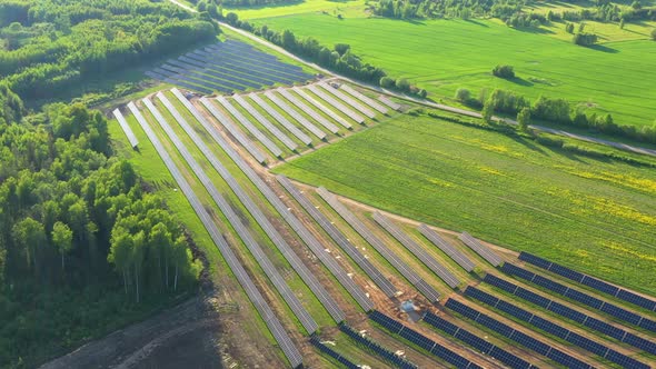 Large Solar Panel Array in Scenic Countryside in Aerial view during ...