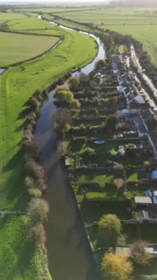 Aerial View of Rye, UK Showcasing Serene River and Quaint Homes