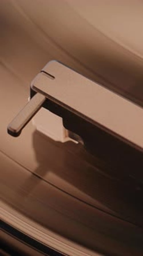 Vinyl Record Spinning On Vintage Turntable Playing Classic Music or Authentic Analog Sound