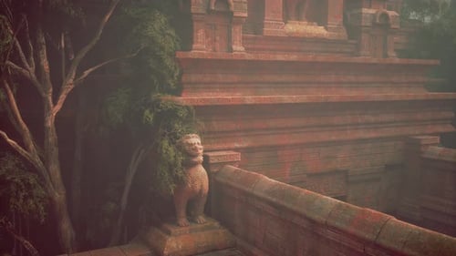 Statue of Person Sitting By Tree