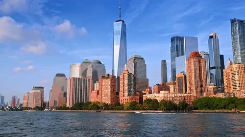 Beautiful buildings at the waterfront of the river. New York skyline from the low angle perspective.