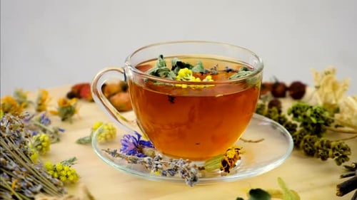 Herbal Tea with Flowers Rotating Close Up