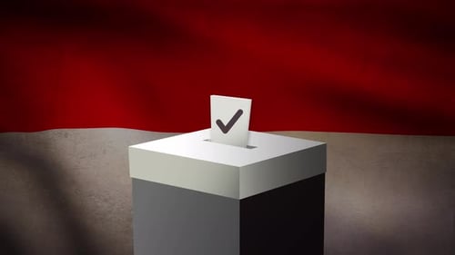 Casting vote into the ballot box during Indonesia election