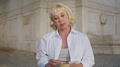 Beautiful Pensioner Writing Diary Outdoors Close Up Old Woman Making Notes