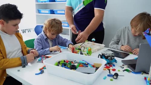 Robotics Programming Class Children Construct and Code Robot STEM Education Using Constructor