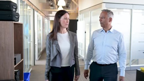 Business People Walking and Talking in Office Corridor 4044 Years
