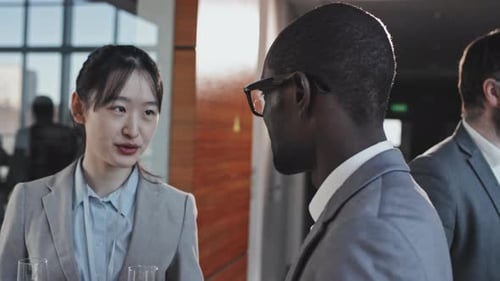 Young Colleagues Discussing Presentation