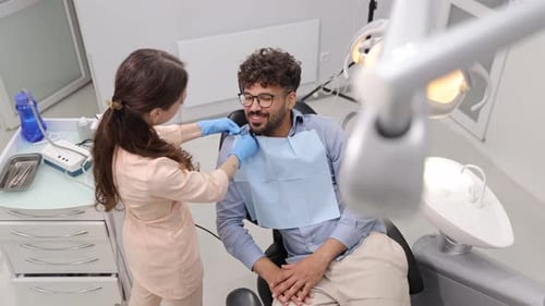 Dentist Consulting with Patient in Modern Comfortable Dental Clinic Vertical Video
