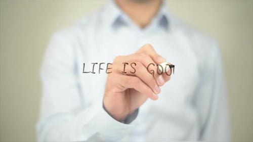 Life is Good Man Writing on Transparent Screen