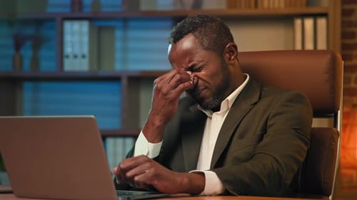 Adult African American Businessman Working on Laptop in Office Unhealthy Tired Man Suffering From