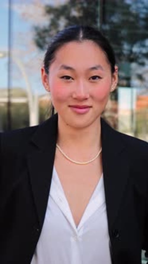 Vertical Individual Close One Happy Business Woman Looking at Camera Smiling with Proud Attitude